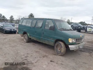 1992 Ford Econoline Wagon XL z VIN 1FBJS31H3NHB42294, wystawiony jako IAAI lot #41409978 z przebiegiem Nie podano mil oraz . Historia ofert i sprzedaży dostępna na DreamBid. Obrazek 1.