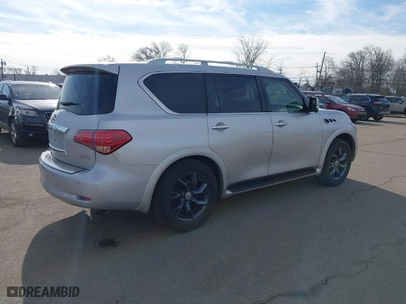 2014 Infiniti QX80 with VIN JN8AZ2NFXE9555130, listed as a IAAI auction lot 41661862 with 119,409 mi miles. Bid and sale history available at carsss.com. Image 4.