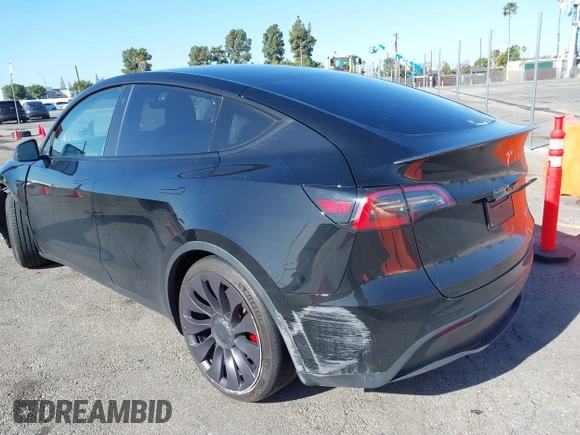 2022 Tesla Model Y Performance with VIN 7SAYGDEF5NF336693, listed as a IAAI auction lot 41805752 with 42,009 mi miles and . Bid and sale history available at DreamBid. Image 3.