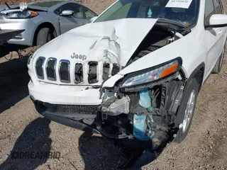 2015 Jeep Cherokee Latitude with VIN 1C4PJMCS7FW503594, listed as a IAAI auction lot 41792820 with 77,325 mi miles. Bid and sale history available at carsss.com. Image 6.