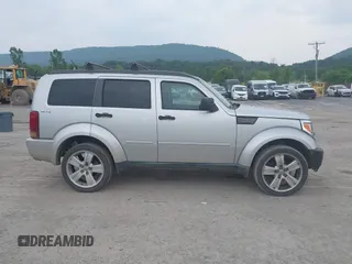2011 Dodge Nitro Heat with VIN 1D4PU4GK1BW598734, listed as a IAAI auction lot 42498891 with 88,444 mi miles and . Bid and sale history available at DreamBid. Image 13.