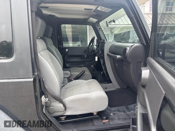 2007 Jeep Wrangler Rubicon with VIN 1J4GA64127L170574, listed as a IAAI auction lot 42474509 with 142,976 mi miles and . Bid and sale history available at DreamBid. Image 5.