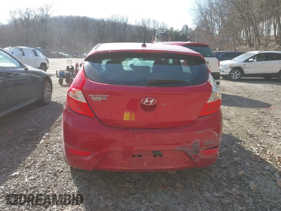 2015 Hyundai Accent Sport with VIN KMHCU5AE5FU200846, listed as a IAAI auction lot 41758805 with 84,987 mi miles. Bid and sale history available at carsss.com. Image 17.