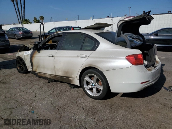 2013 BMW 3 Series 320i with VIN WBA3B1C50DK128766, listed as a Copart auction lot 86587114 with 0 mi miles and Salvage Title. Bid and sale history available at carsss.com. Image 2.