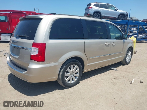 2014 Chrysler Town & Country Touring with VIN 2C4RC1BG3ER418600, listed as a IAAI auction lot 42132277 with 72,406 mi miles and . Bid and sale history available at DreamBid. Image 4.