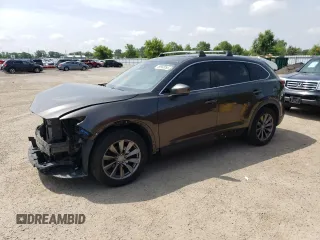 2018 Mazda CX-9 Touring с VIN JM3TCBCY4J0235396, выставлен на аукционе Copart как лот 59950055 с пробегом 166 300 миль миль и Списание • Salvage title. История ставок и продаж доступна на DreamBid. Изображение 1.