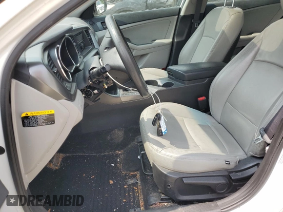 2012 Kia Optima LX z VIN KNAGM4A74C5296344, wystawiony jako Copart lot #58660875 z przebiegiem 151 386 mil mil oraz Szkoda całkowita • Salvage title. Historia ofert i sprzedaży dostępna na DreamBid. Obrazek 7.