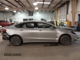 2017 Ford Fusion SE z VIN 3FA6P0H95HR203170, wystawiony jako IAAI lot #41569303 z przebiegiem 143 287 mil mil oraz . Historia ofert i sprzedaży dostępna na DreamBid. Obrazek 14.