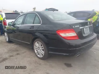 2009 Mercedes-Benz C-Class 3.0L Sport with VIN WDDGF54X19F207143, listed as a IAAI auction lot 41718227 with 128,147 mi miles. Bid and sale history available at carsss.com. Image 3.