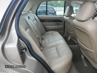 2005 Mercury Grand Marquis LS Premium z VIN 2MEFM75W15X660639, wystawiony jako Copart lot #56580605 z przebiegiem 149 136 mil mil oraz Szkody całkowita. Historia ofert i sprzedaży dostępna na DreamBid. Obrazek 10.
