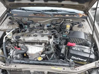 2000 Nissan Altima XE with VIN 1N4DL01D0YC181174, listed as a IAAI auction lot 41798721 with 119,682 mi miles. Bid and sale history available at carsss.com. Image 10.