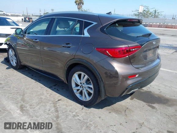 2018 Infiniti QX30 Premium with VIN SJKCH5CP5JA054091, listed as a IAAI auction lot 42471932 with 28,713 mi miles and . Bid and sale history available at DreamBid. Image 3.