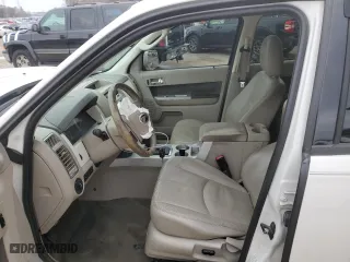 2009 Mercury Mariner Premier with VIN 4M2CU87G79KJ03236, listed as a Copart auction lot 84059324 with 130,335 mi miles and Salvage Title. Bid and sale history available at carsss.com. Image 7.