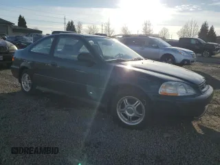 1998 Honda Civic DX with VIN 1HGEJ6221WL116188, listed as a Copart auction lot 47105105 with 50,017 mi miles and Salvage Title. Bid and sale history available at DreamBid. Image 4.