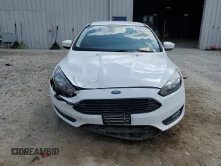 2018 Ford Focus SE with VIN 1FADP3FE5JL220077, listed as a Copart auction lot 52395795 with 87,785 mi miles and Salvage Title. Bid and sale history available at carsss.com. Image 5.