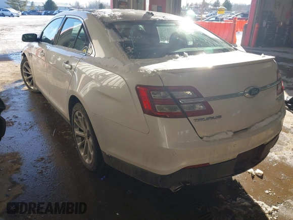 2015 Ford Taurus Limited z VIN 1FAHP2F88FG125499, wystawiony jako IAAI lot #41343023 z przebiegiem 126 047 mil mil oraz . Historia ofert i sprzedaży dostępna na DreamBid. Obrazek 3.