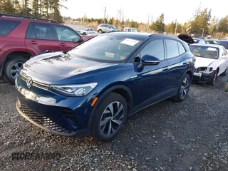 2023 Volkswagen ID.4 Pro z VIN 1V2DNPE81PC017620, wystawiony jako IAAI lot #41573053 z przebiegiem 15 462 mil mil oraz . Historia ofert i sprzedaży dostępna na DreamBid. Obrazek 20.