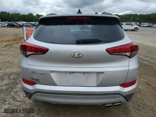 2018 Hyundai Tucson Value with VIN KM8J33A23JU743304, listed as a Copart auction lot 71563124 with 79,964 mi miles and Salvage Title. Bid and sale history available at carsss.com. Image 6.