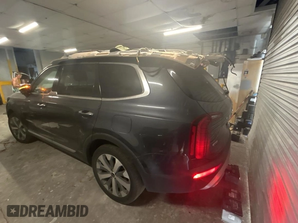 2020 Kia Telluride S with VIN 5XYP6DHC1LG073783, listed as a Copart auction lot 54958565 with 77,176 mi miles and Clean Title. Bid and sale history available at DreamBid. Image 3.