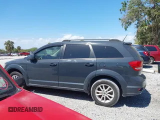 2018 Dodge Journey SXT with VIN 3C4PDCBG7JT172075, listed as a IAAI auction lot 41840766 with 64,572 mi miles and . Bid and sale history available at carsss.com. Image 13.