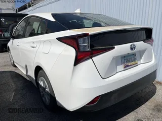 2019 Toyota Prius L Eco z VIN JTDKARFU8K3089984, wystawiony jako IAAI lot #42353673 z przebiegiem 89 665 mil mil oraz . Historia ofert i sprzedaży dostępna na DreamBid. Obrazek 1.