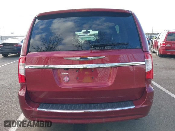 2012 Chrysler Town & Country Touring-L with VIN 2C4RC1CG3CR413148, listed as a IAAI auction lot 42040272 with 137,631 mi miles. Bid and sale history available at carsss.com. Image 16.