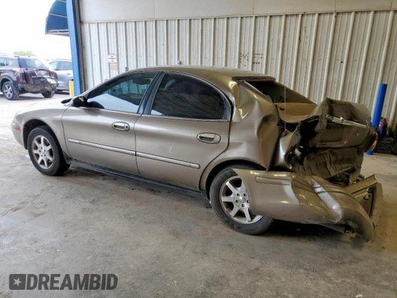 2002 Mercury Sable GS z VIN 1MEFM50U02G652804, wystawiony jako Copart lot #57405035 z przebiegiem 264 042 mil mil oraz Szkody całkowita. Historia ofert i sprzedaży dostępna na DreamBid. Obrazek 2.