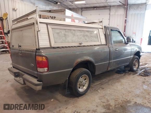 1998 Ford Ranger XL z VIN 1FTYR10CXWUC58486, wystawiony jako IAAI lot #42507768 z przebiegiem 214 343 mil mil oraz . Historia ofert i sprzedaży dostępna na DreamBid. Obrazek 4.
