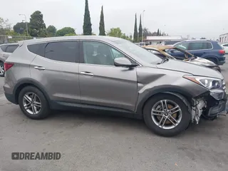 2018 Hyundai Santa Fe 2.4L with VIN 5XYZT3LB7JG569517, listed as a IAAI auction lot 42141100 with 57,854 mi miles and . Bid and sale history available at DreamBid. Image 14.