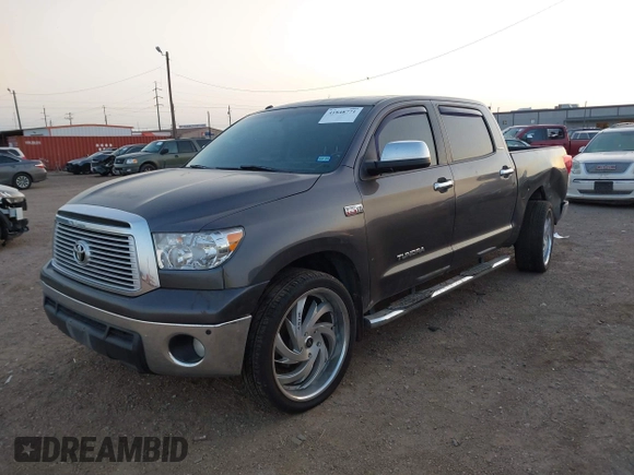 2013 Toyota Tundra Limited with VIN 5TFFY5F19DX137337, listed as a IAAI auction lot 41848771 with 182,886 mi miles and . Bid and sale history available at DreamBid. Image 2.