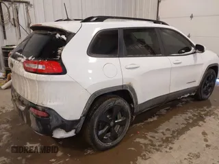 2016 Jeep Cherokee Latitude with VIN 1C4PJMCS5GW219429, listed as a IAAI auction lot 41578760 with 161,964 mi miles and . Bid and sale history available at carsss.com. Image 4.