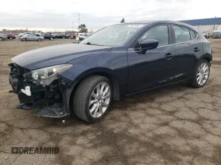 2016 Mazda 3 S Touring with VIN JM1BM1M37G1285971, listed as a Copart auction lot 79074884 with 123,309 mi miles and Clean title. Bid and sale history available at DreamBid. Image 1.