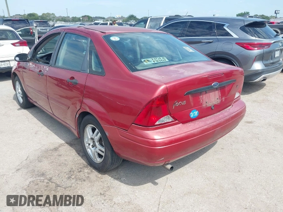 2004 Ford Focus SE z VIN 1FAFP34384W120763, wystawiony jako IAAI lot #42339251 z przebiegiem 262 686 mil mil oraz . Historia ofert i sprzedaży dostępna na DreamBid. Obrazek 3.