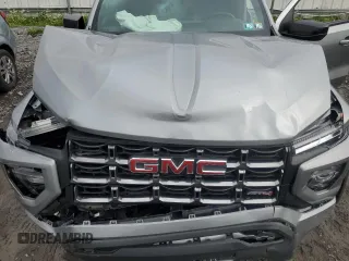 2023 GMC Canyon 4WD AT4 with VIN 1GTP6DEK4P1124937, listed as a Copart auction lot 66103474 with 10,566 mi miles and Salvage Title. Bid and sale history available at carsss.com. Image 11.