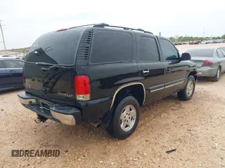 2002 Chevrolet Tahoe LT with VIN 1GNEC13Z72R176028, listed as a IAAI auction lot 41897050 with 216,553 mi miles. Bid and sale history available at carsss.com. Image 4.