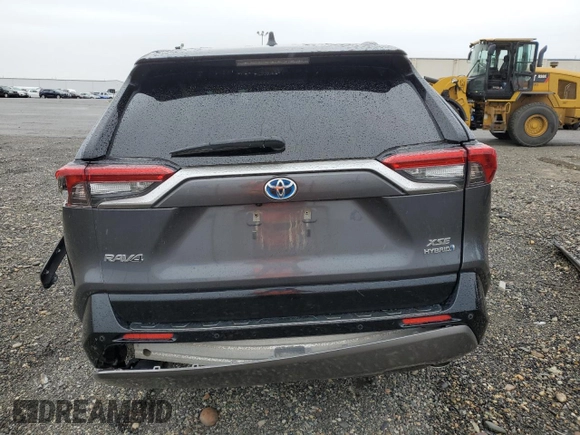 2019 Toyota RAV4 Hybrid XSE with VIN JTMEWRFV3KD517901, listed as a Copart auction lot 57329545 with Not provided miles and Salvage title. Bid and sale history available at DreamBid. Image 6.