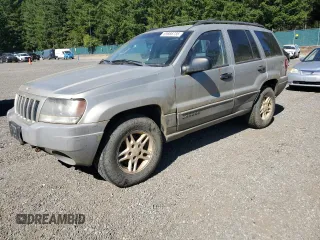 2004 Jeep Grand Cherokee Laredo z VIN 1J4GW48SX4C243095, wystawiony jako Copart lot #65666735 z przebiegiem Nie podano mil oraz Czysty tytuł • Clean title. Historia ofert i sprzedaży dostępna na DreamBid. Obrazek 1.