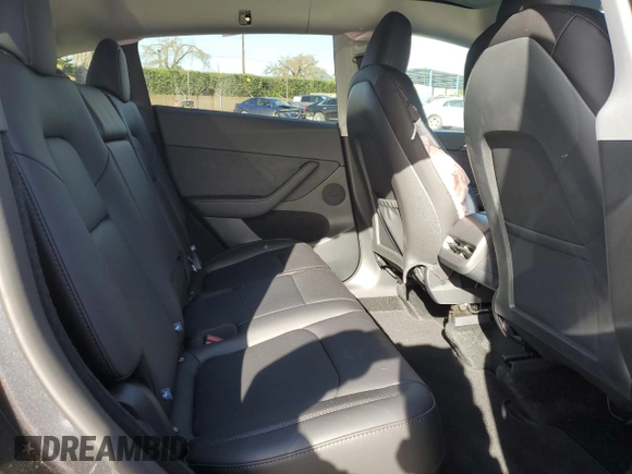 2025 Tesla Model Y Long Range with VIN 7SAYGDEE4SF272942, listed as a Copart auction lot 45817885 with 2,308 mi miles and Salvage Title. Bid and sale history available at DreamBid. Image 12.