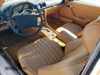 1987 Mercedes-Benz 560 SL with VIN WDBBA48D8HA068748, listed as a Copart auction lot 46874285 with 58,817 mi miles and Clean Title. Bid and sale history available at DreamBid. Image 8.