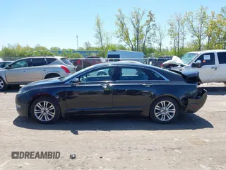 2015 Lincoln MKZ with VIN 3LN6L2J96FR625761, listed as a IAAI auction lot 42235387 with 132,183 mi miles and . Bid and sale history available at DreamBid. Image 14.