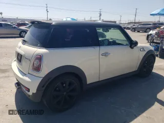 2009 MINI Hardtop S with VIN WMWMF73569TW80561, listed as a Copart auction lot 52615805 with 109,968 mi miles and Salvage title. Bid and sale history available at DreamBid. Image 3.