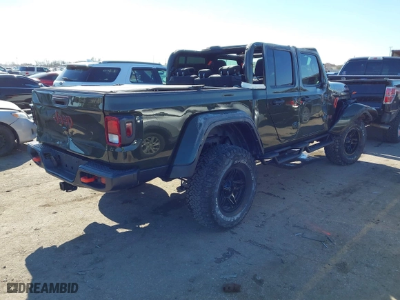 2022 Jeep Gladiator Mojave with VIN 1C6JJTEG5NL110886, listed as a IAAI auction lot 41410576 with 44,307 mi miles. Bid and sale history available at carsss.com. Image 4.