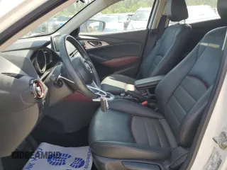2016 Mazda CX-3 Touring with VIN JM1DKDC71G0130858, listed as a Copart auction lot 52047765 with 115,299 mi miles and Salvage Title. Bid and sale history available at carsss.com. Image 7.