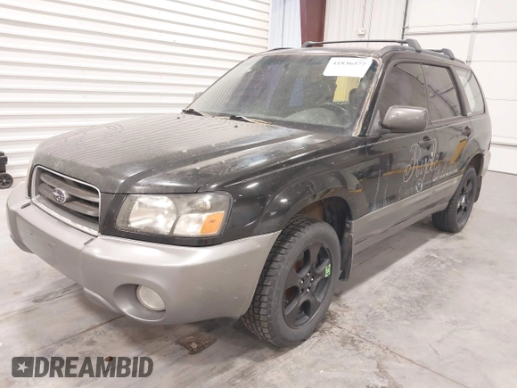 2003 Subaru Forester XS with VIN JF1SG65643H755247, listed as a IAAI auction lot 41836577 with 184,677 mi miles. Bid and sale history available at carsss.com. Image 2.