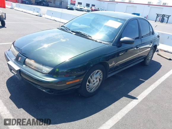 1999 Saturn SL с VIN 1G8ZK5274XZ304652, выставлен на аукционе IAAI как лот 42618620 с пробегом 98 131 миль миль и . История ставок и продаж доступна на DreamBid. Изображение 2.