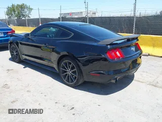 2015 Ford Mustang EcoBoost z VIN 1FA6P8TH6F5382719, wystawiony jako IAAI lot #42316250 z przebiegiem 119 412 mil mil oraz . Historia ofert i sprzedaży dostępna na DreamBid. Obrazek 3.
