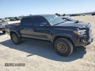 2023 Toyota Tacoma SR z VIN 3TMCZ5AN5PM533379, wystawiony jako Copart lot #55554265 z przebiegiem 31 776 mil mil oraz Szkoda całkowita • Salvage title. Historia ofert i sprzedaży dostępna na DreamBid. Obrazek 4.