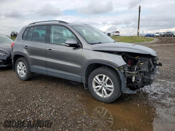 2017 Volkswagen Tiguan with VIN WVGHV7AX1HK017717, listed as a Copart auction lot 64948373 with 77,825 mi miles and Salvage title. Bid and sale history available at DreamBid. Image 4.