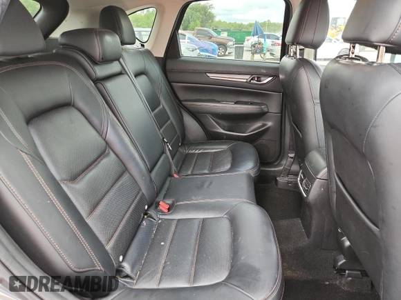 2019 Mazda CX-5 Grand Touring with VIN JM3KFADM2K1637664, listed as a Copart auction lot 63400975 with 45,663 mi miles and Salvage title. Bid and sale history available at DreamBid. Image 11.