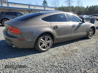 2012 Audi A7 Premium Plus с VIN WAUSGAFC3CN002390, выставлен на аукционе Copart как лот 43954075 с пробегом 151 553 миль миль и Списание • Salvage title. История ставок и продаж доступна на DreamBid. Изображение 3.